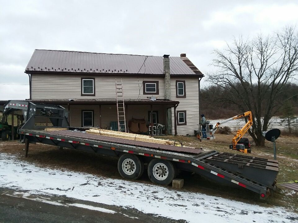 Storm damage roof repair with matching architectural shingles